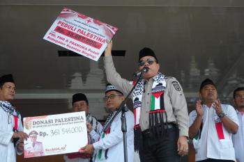 Bupati Suport Aksi Peduli Palestina, Ribuan Warga Kuansing Padati Lapangan Limuno